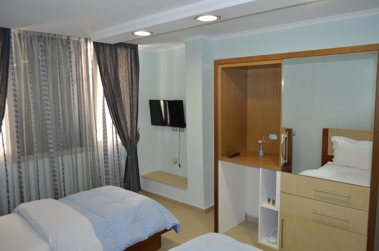 Hotel Piemonte Tirana Bagian luar foto
